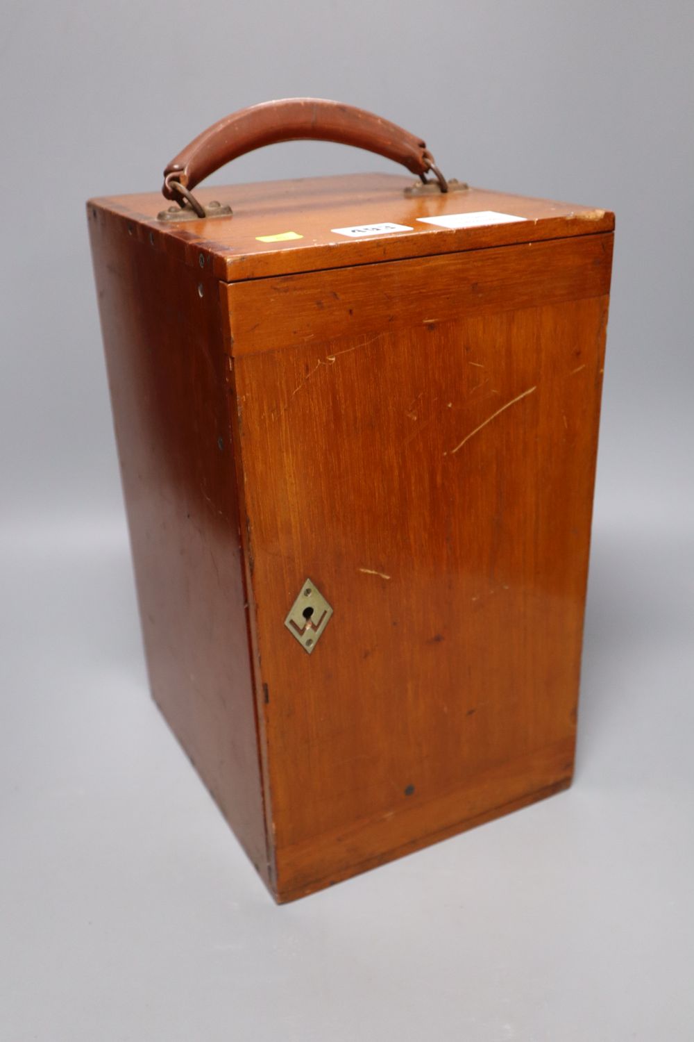 A cased microscope, case height 35cm